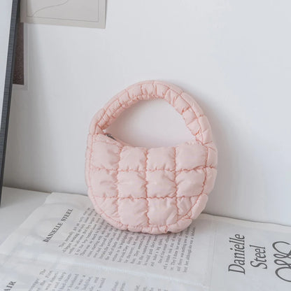 Mini torebka pikowana do ręki