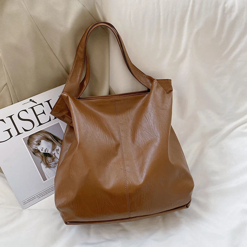 Skórzana torba shopper z regulowanym paskiem