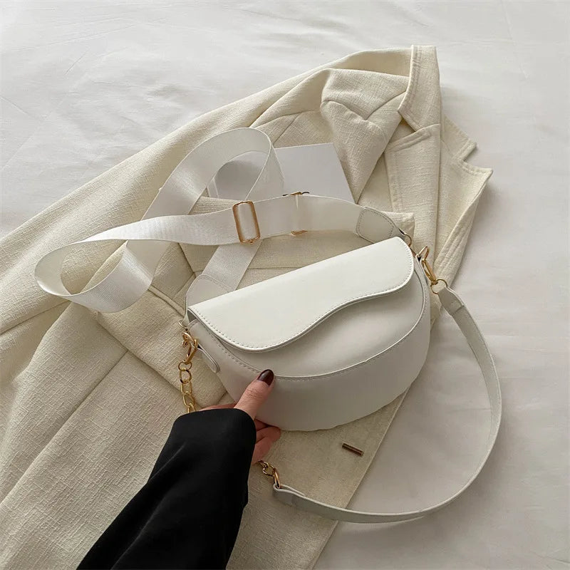 Mała półokrągła torebka typu Crossbody