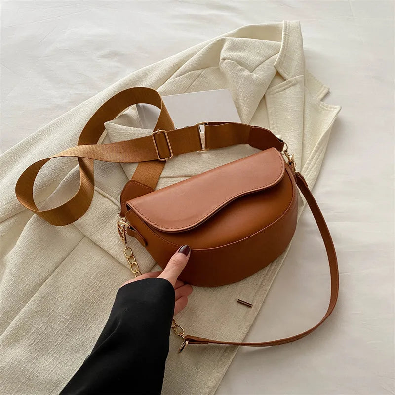 Mała półokrągła torebka typu Crossbody