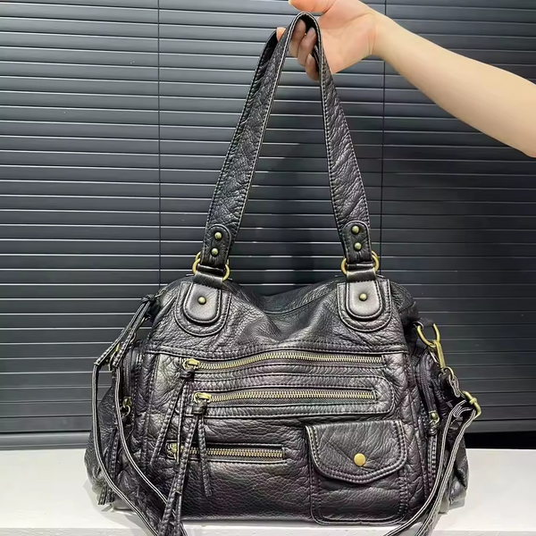 Duża ciemna torebka w stylu vintage z wieloma kieszeniami